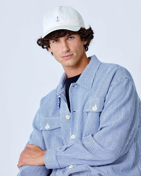 La Paz Santos Cap In Off White/Wind Blue Logo